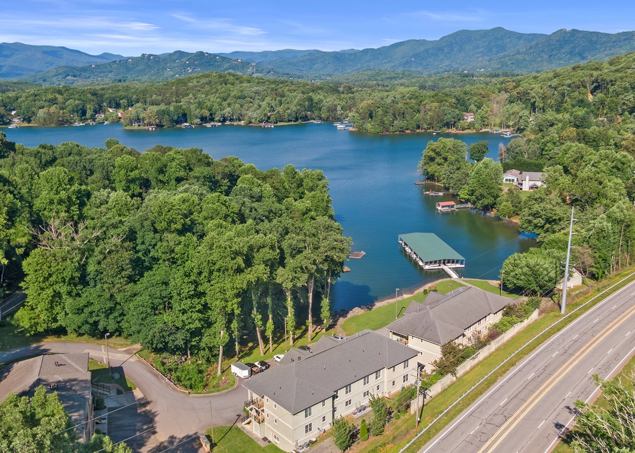 view of the condos and lake